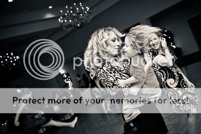 IMAGE: http://i475.photobucket.com/albums/rr120/noWAFFLESforU/Jenny%20and%20Peter/PJ-Wedding-420_LR.jpg